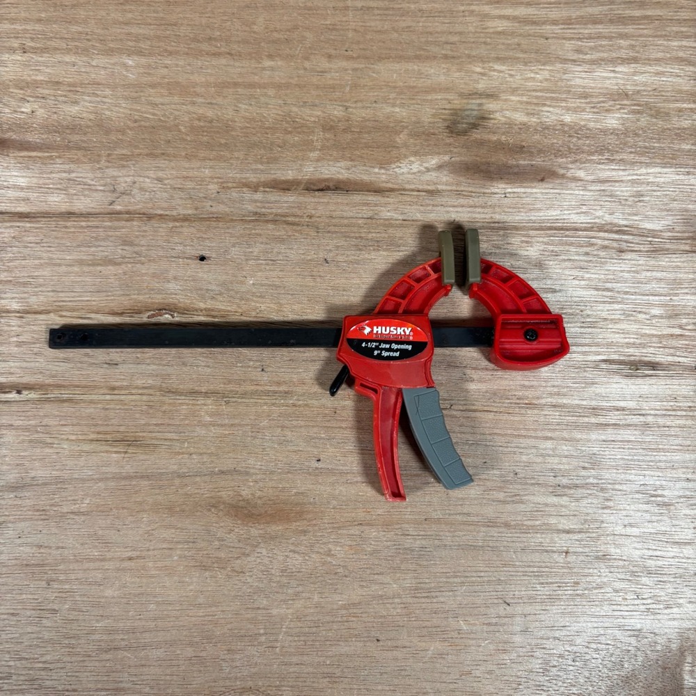 Husky 4.5 inch Jaw Opening 9 inch Spread Quick Release Bar Clamp Red Black Tool